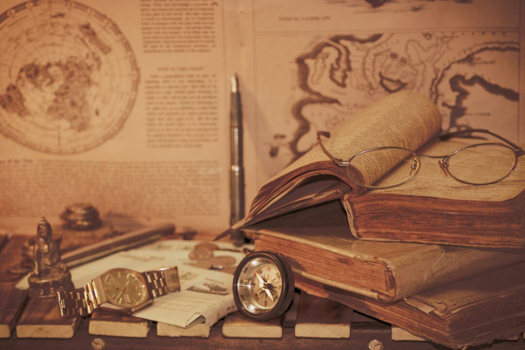 old book with magnifying glass